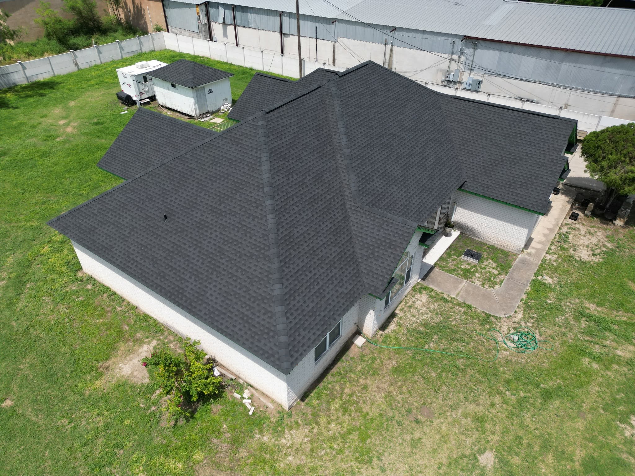 Completed Charcoal shingle roof on a home in Palmview, Texas