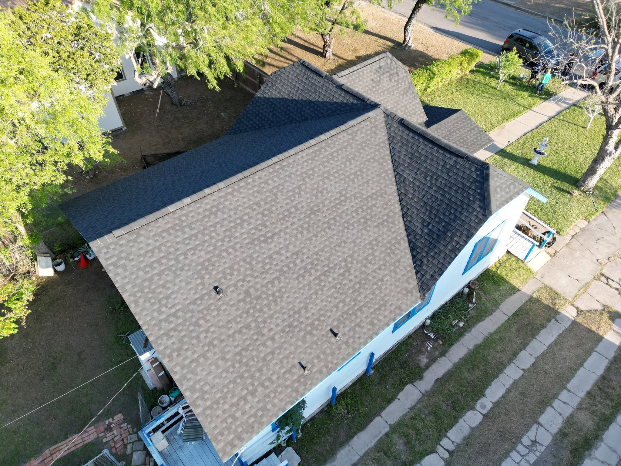 Completed Charcoal shingle roof on a home in Weslaco, Texas